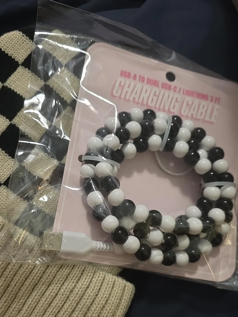 Checkerboard Beanie Hat in Cream & Black And Checkered Charging Cable